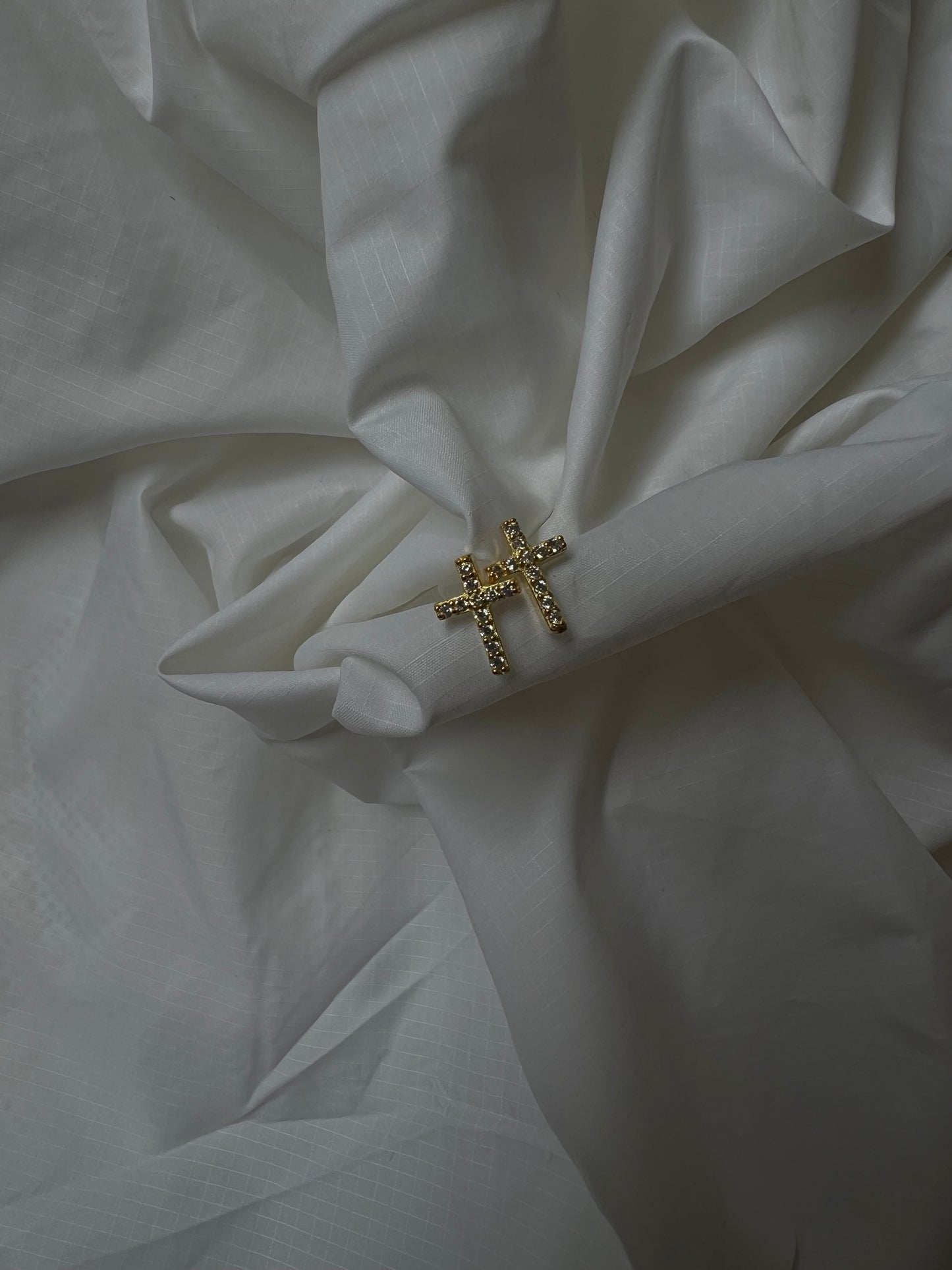 The classic cross stud earrings